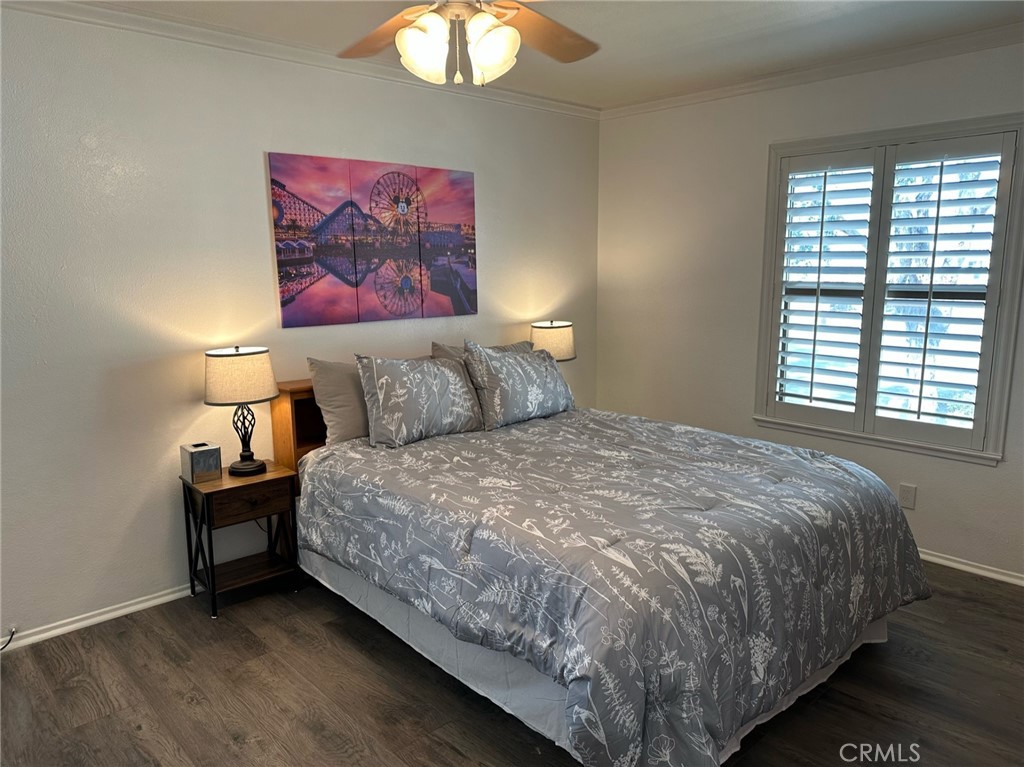 9051 Cobblestone Lane, Unit 40 Cypress, CA 90630 - Photo 14 of 38 a bed sitting in a bedroom next to a window