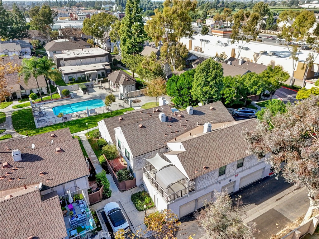 9051 Cobblestone Lane, Unit 40 Cypress, CA 90630 - Photo 22 of 38 an aerial view of a house with garden space and street view