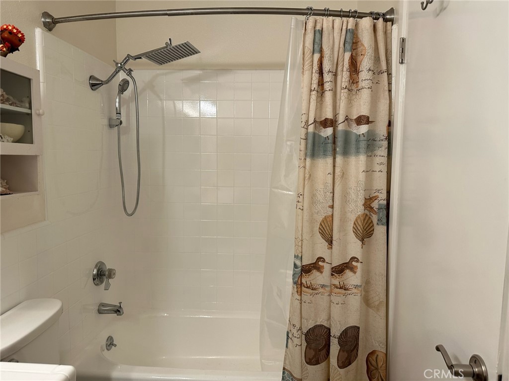 9051 Cobblestone Lane, Unit 40 Cypress, CA 90630 - Photo 10 of 38 a bathroom with a shower