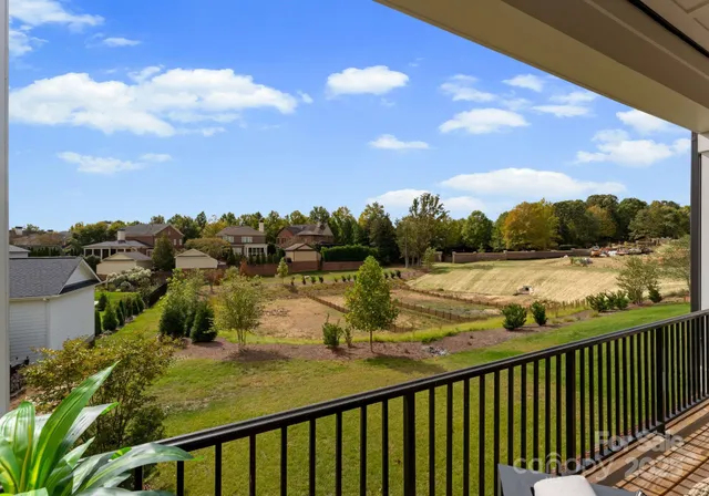 a spacious bedroom with a bed and a window