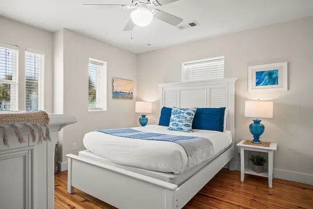 a bedroom with a bed and a dresser