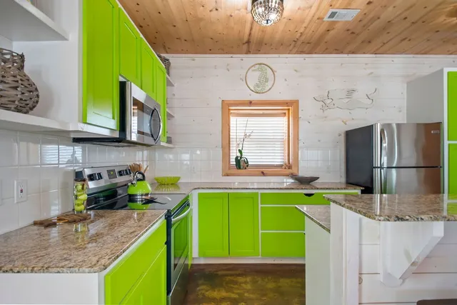 a kitchen with lots of counter space and a sink