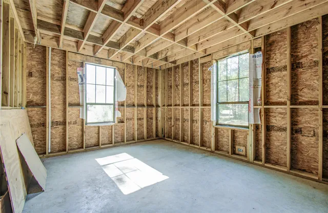 front view of a brick house with an empty space