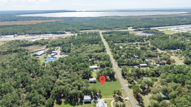 an aerial view of residential building and ocean