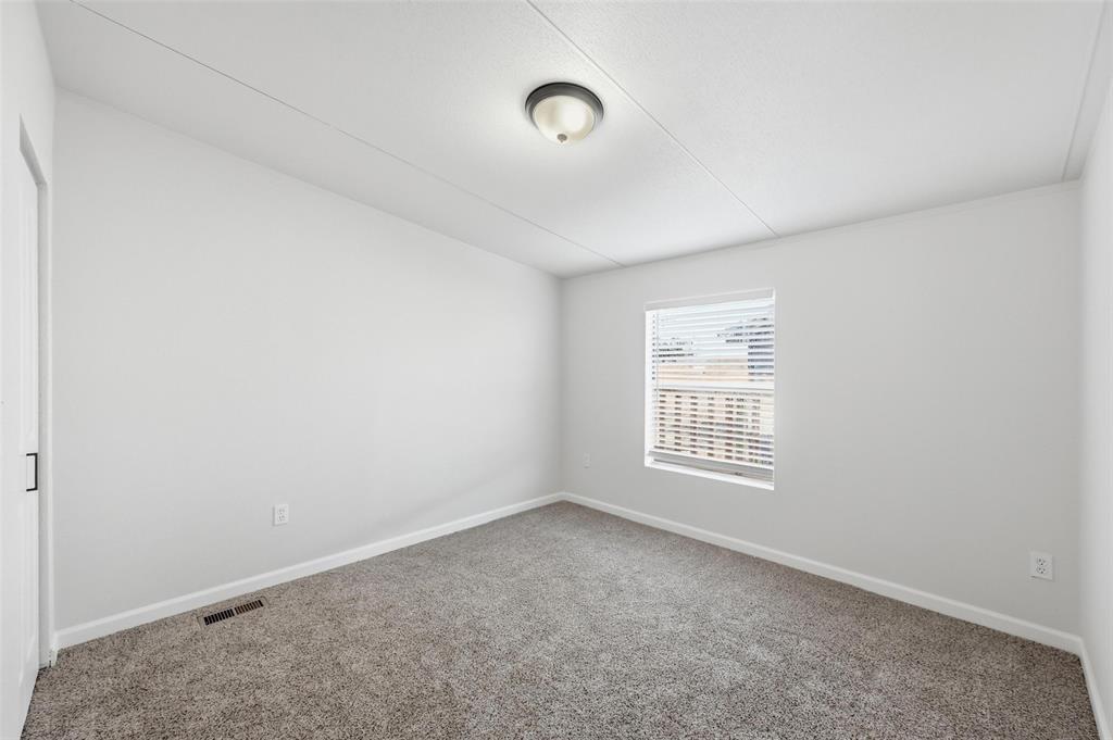 13820 Delta Drive Venus, TX 76084 - Photo 21 of 30 a view of an empty room with a window