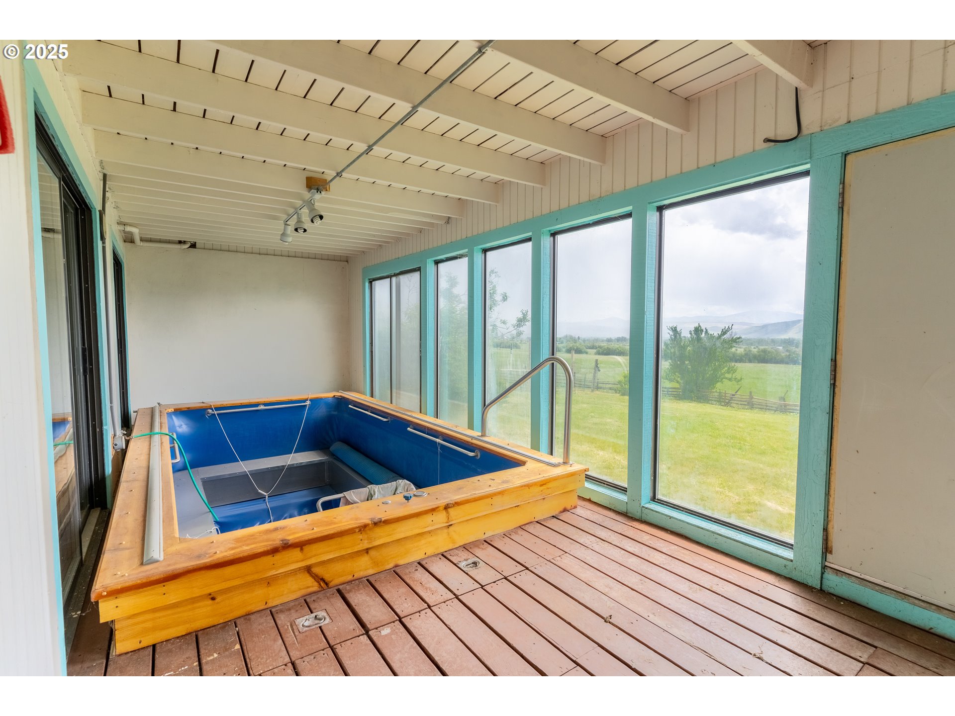 47433 Slaughterhouse Road Halfway, OR 97834 - Photo 3 of 16 a view of swimming pool with a lounge chairs