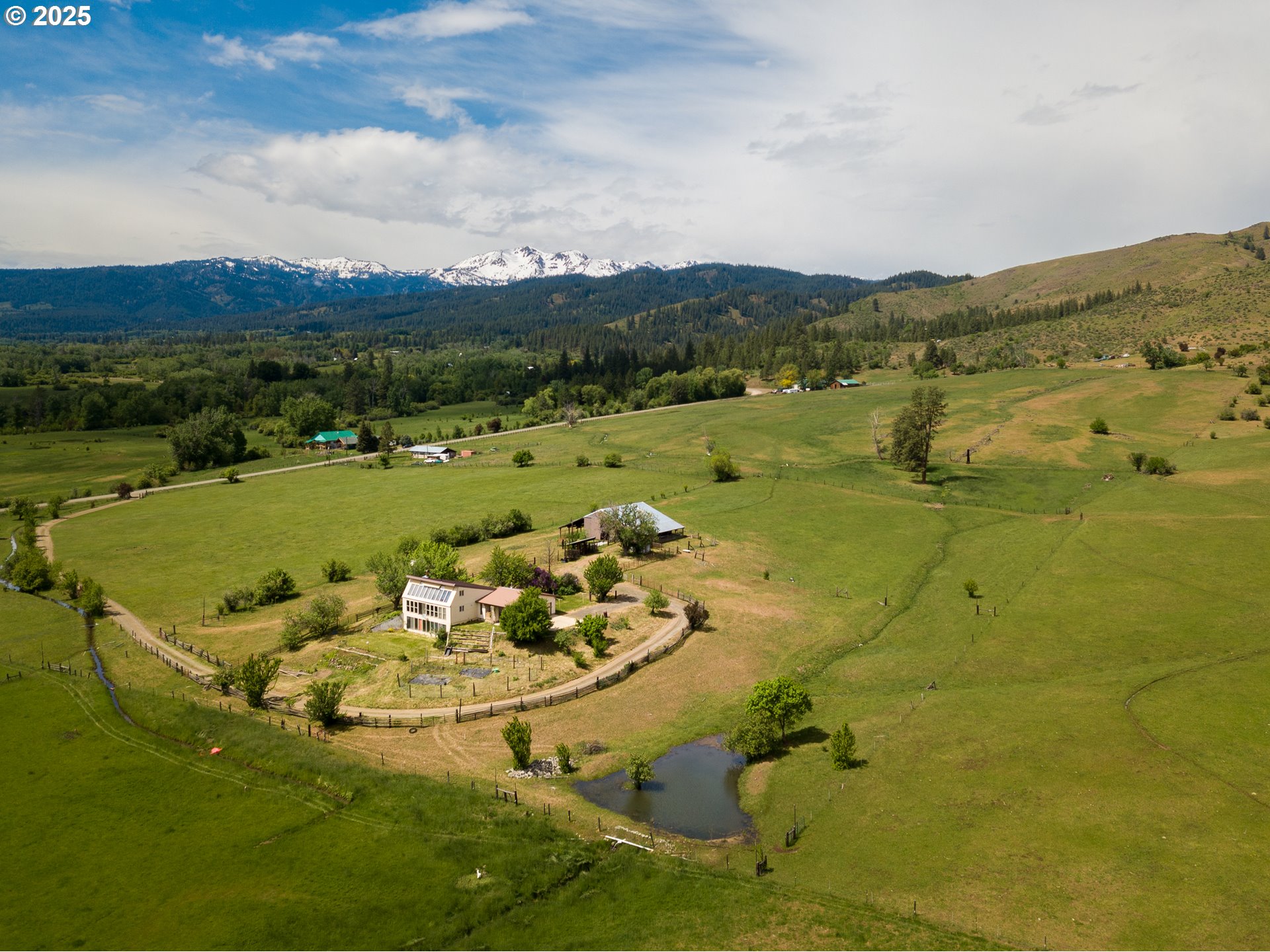 47433 Slaughterhouse Road Halfway, OR 97834 - Photo 9 of 16 a view of a lake with a mountain