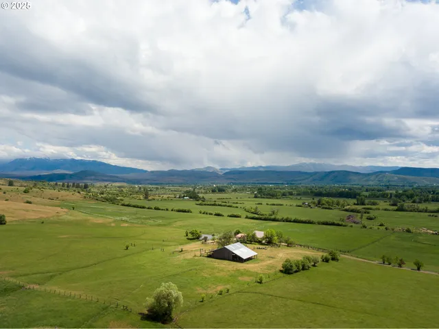 a view of an ocean and a houses