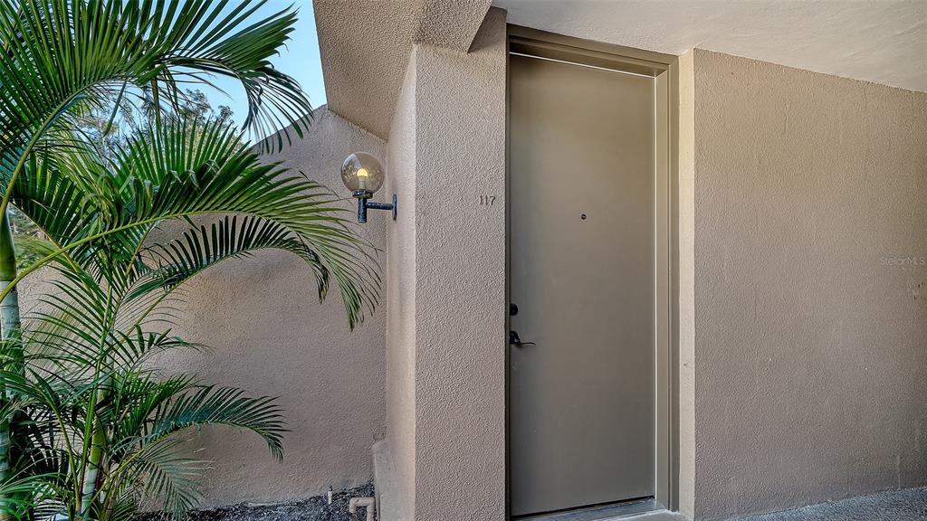 117 Pass Key Road, Unit 117 Sarasota, FL 34242 - Photo 2 of 59 a close view of a plant in a bathroom