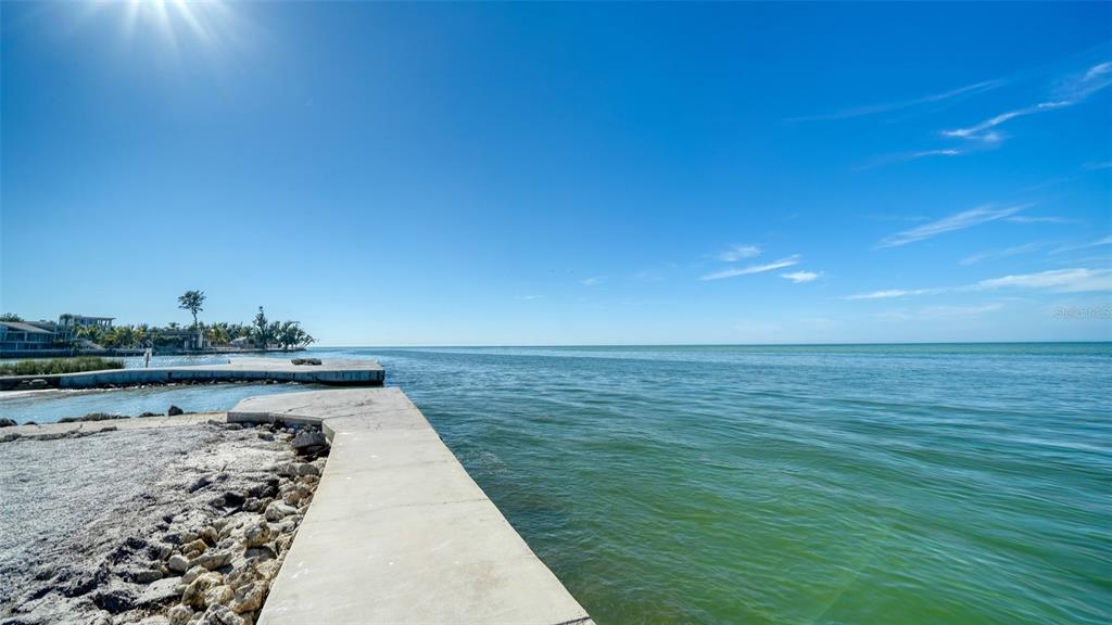 117 Pass Key Road, Unit 117 Sarasota, FL 34242 - Photo 30 of 59 a view of lake and mountain