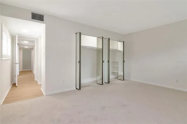 a view of an empty room and window