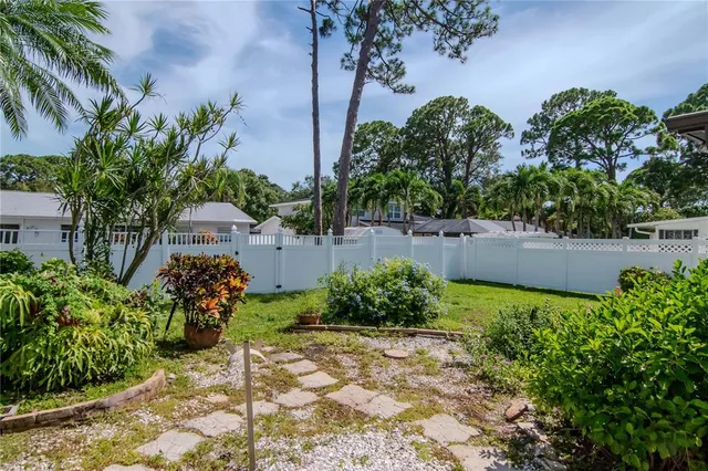 a view of a garden with a bench