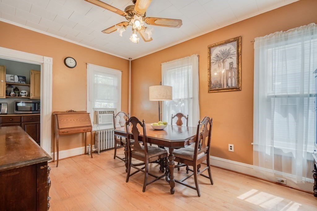 37 Phoenix Street Springfield, MA 01104 - Photo 6 of 27 a view of a dining room with furniture window and wooden floor