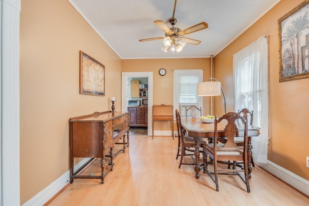37 Phoenix Street Springfield, MA 01104 - Photo 7 of 27 a view of a dining room with furniture and chandelier
