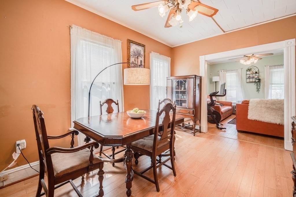 37 Phoenix Street Springfield, MA 01104 - Photo 8 of 27 a view of a dining room with furniture and wooden floor