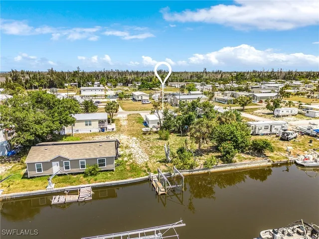 a view of a lake with a city