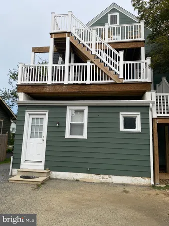 a view of a house with a deck