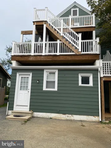 a view of a house with a deck