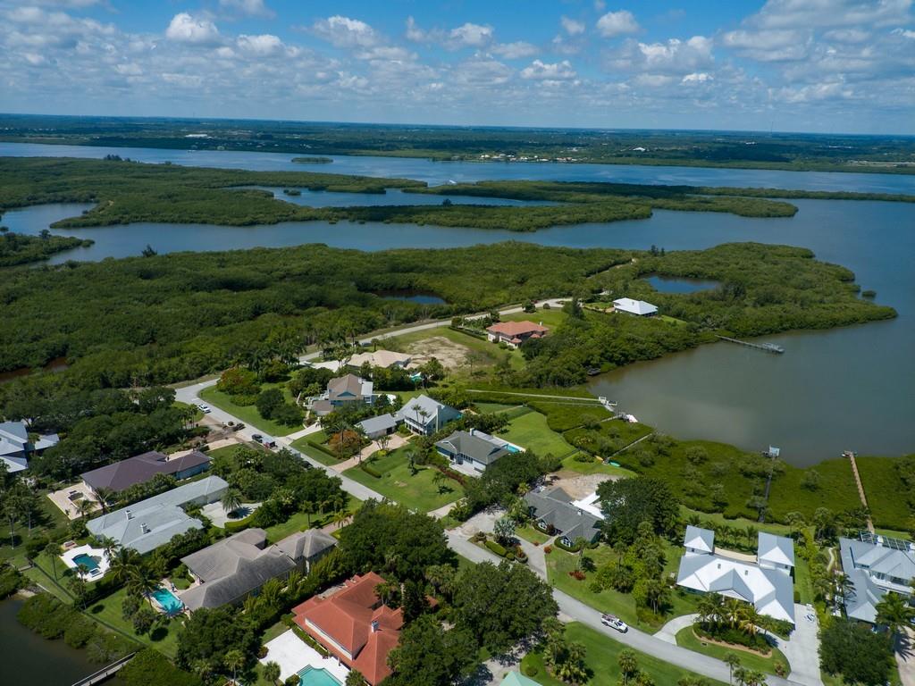 1850 Bayview Court Vero Beach, FL 32963 - Photo 22 of 23 a view of a golf course with a lake