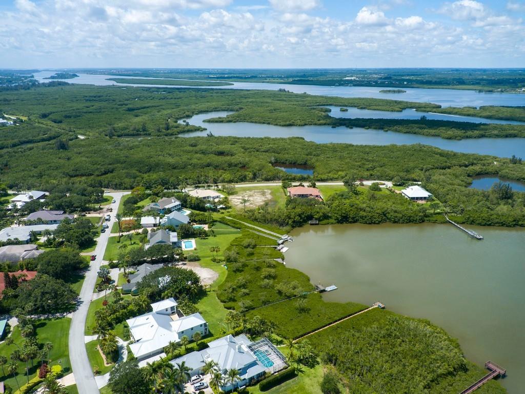 1850 Bayview Court Vero Beach, FL 32963 - Photo 23 of 23 a view of a lake with a city