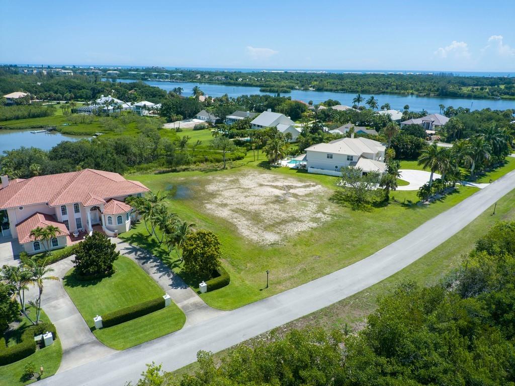 1850 Bayview Court Vero Beach, FL 32963 - Photo 3 of 23 an aerial view of residential houses with outdoor space and trees