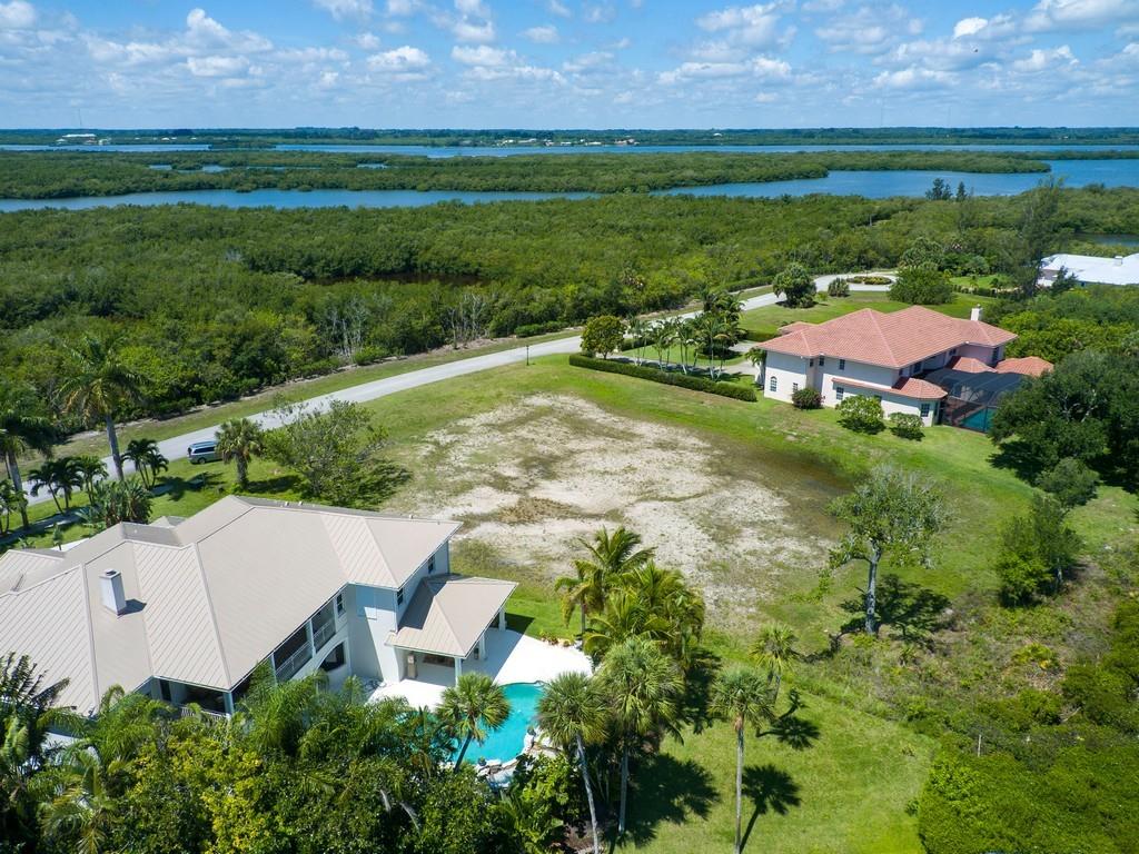 1850 Bayview Court Vero Beach, FL 32963 - Photo 5 of 23 an aerial view of a house with garden space and outdoor seating