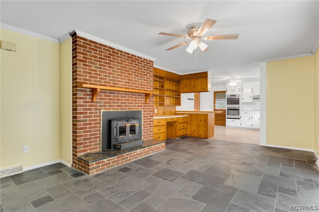 7000 Venable Road Kents Store, VA 23084 - Photo 11 of 45 a view of a kitchen with furniture and a fireplace