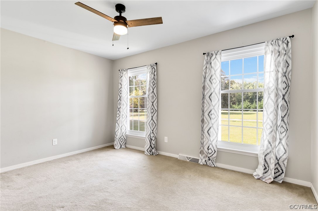 7000 Venable Road Kents Store, VA 23084 - Photo 17 of 45 a view of room with window and ceiling fan