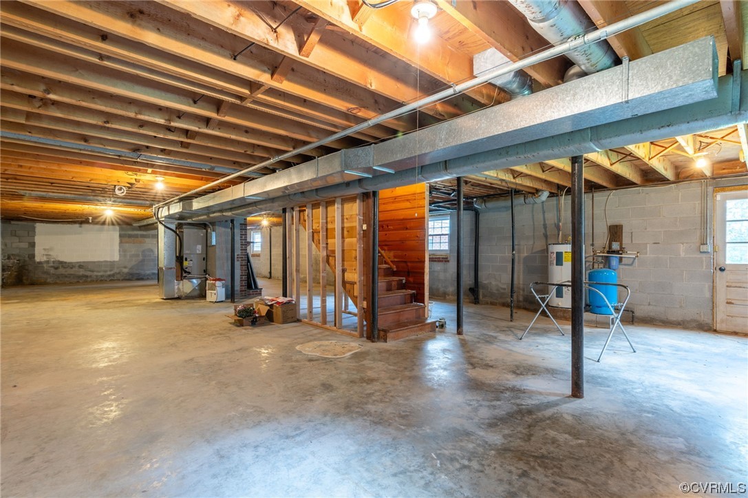 7000 Venable Road Kents Store, VA 23084 - Photo 22 of 45 a view of an empty room with wooden floor
