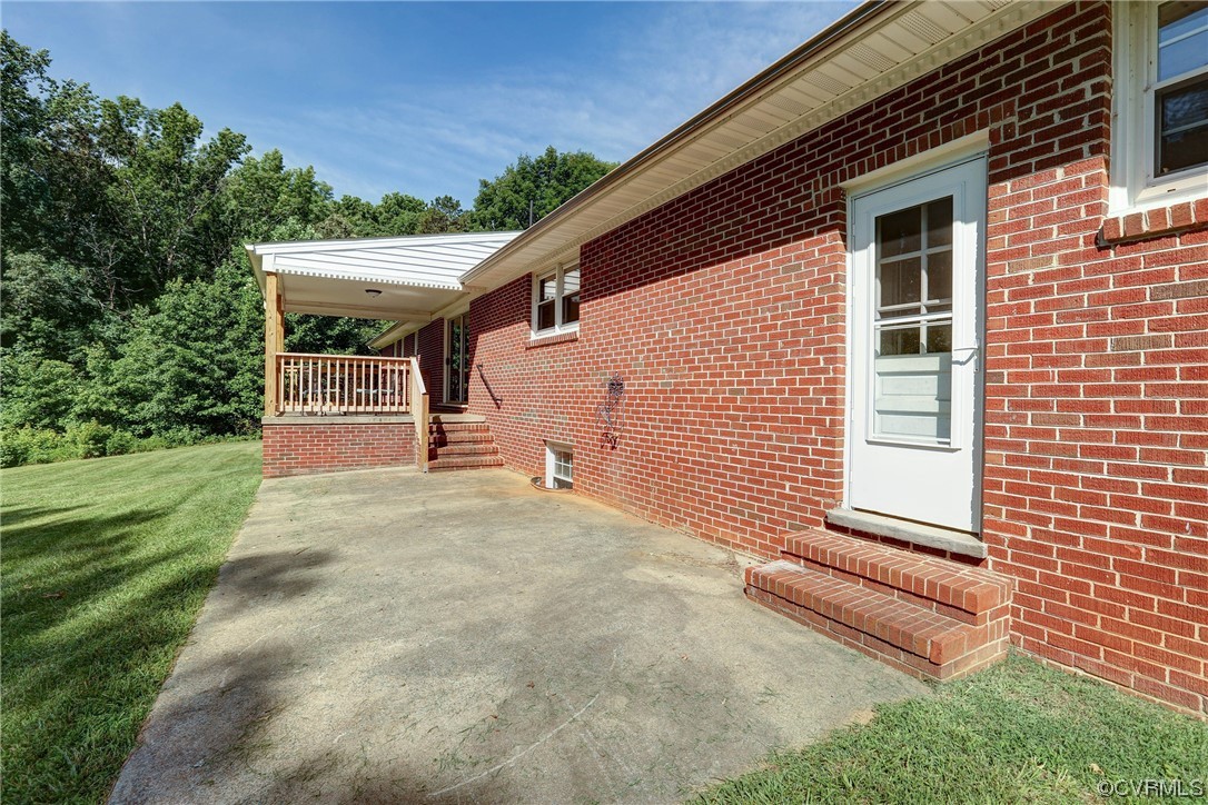 7000 Venable Road Kents Store, VA 23084 - Photo 28 of 45 a front view of a house with a yard