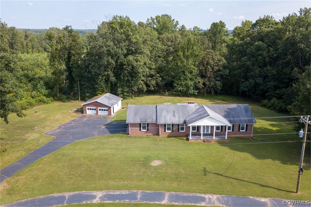 7000 Venable Road Kents Store, VA 23084 - Photo 30 of 45 an aerial view of a house with swimming pool and deck