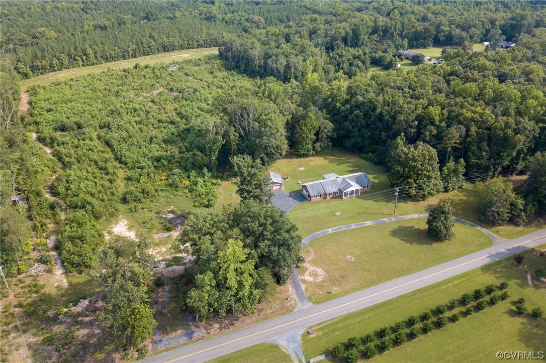 7000 Venable Road Kents Store, VA 23084 - Photo 33 of 45 a view of a yard with an outdoor seating