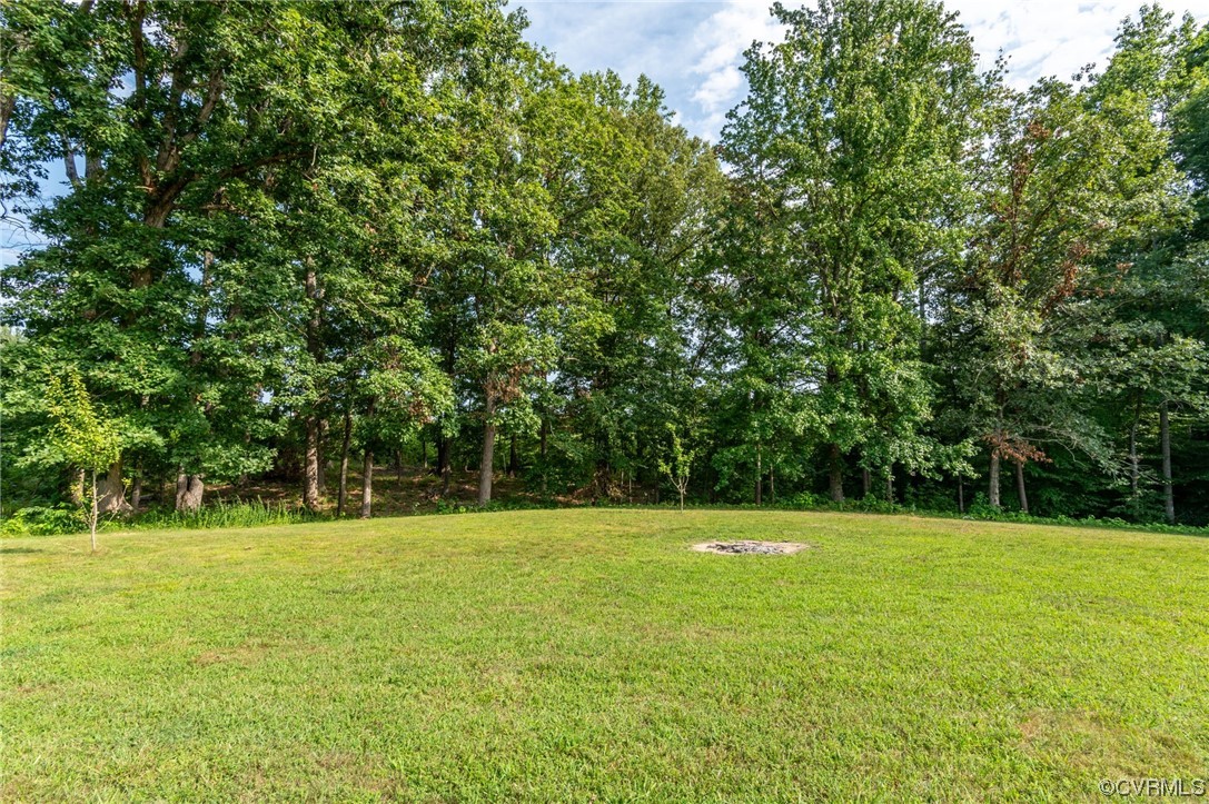 7000 Venable Road Kents Store, VA 23084 - Photo 43 of 45 a view of a park with trees in the background