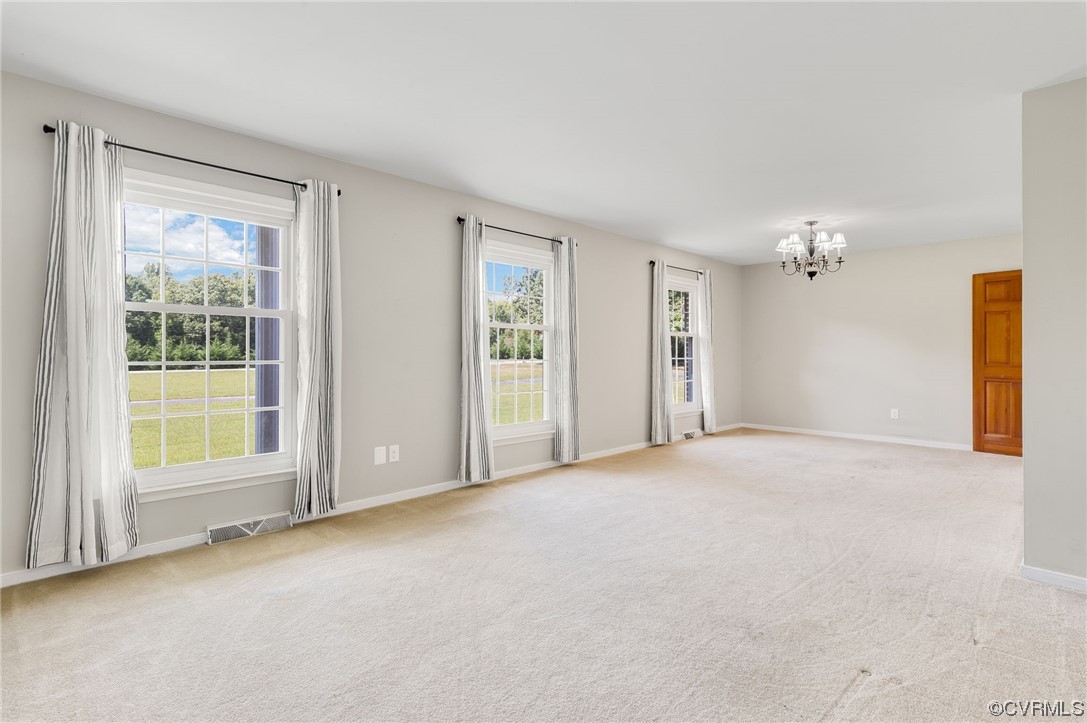 7000 Venable Road Kents Store, VA 23084 - Photo 6 of 45 an empty room with windows