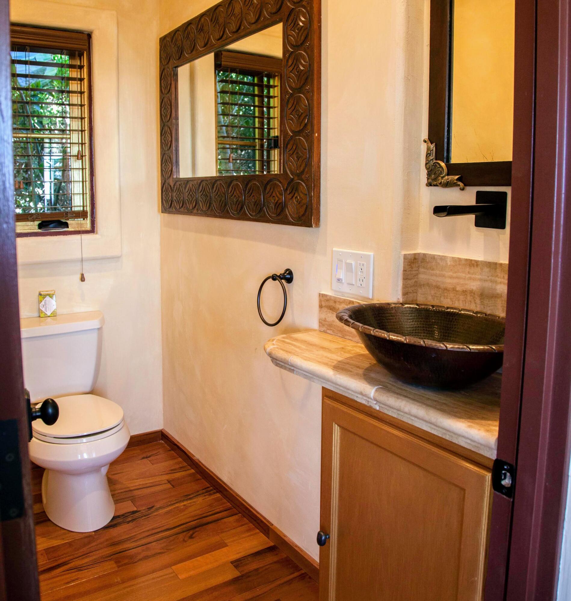 1933 Eucalyptus Hill Road Santa Barbara, CA 93108 - Photo 4 of 11 a bathroom with a toilet and a sink