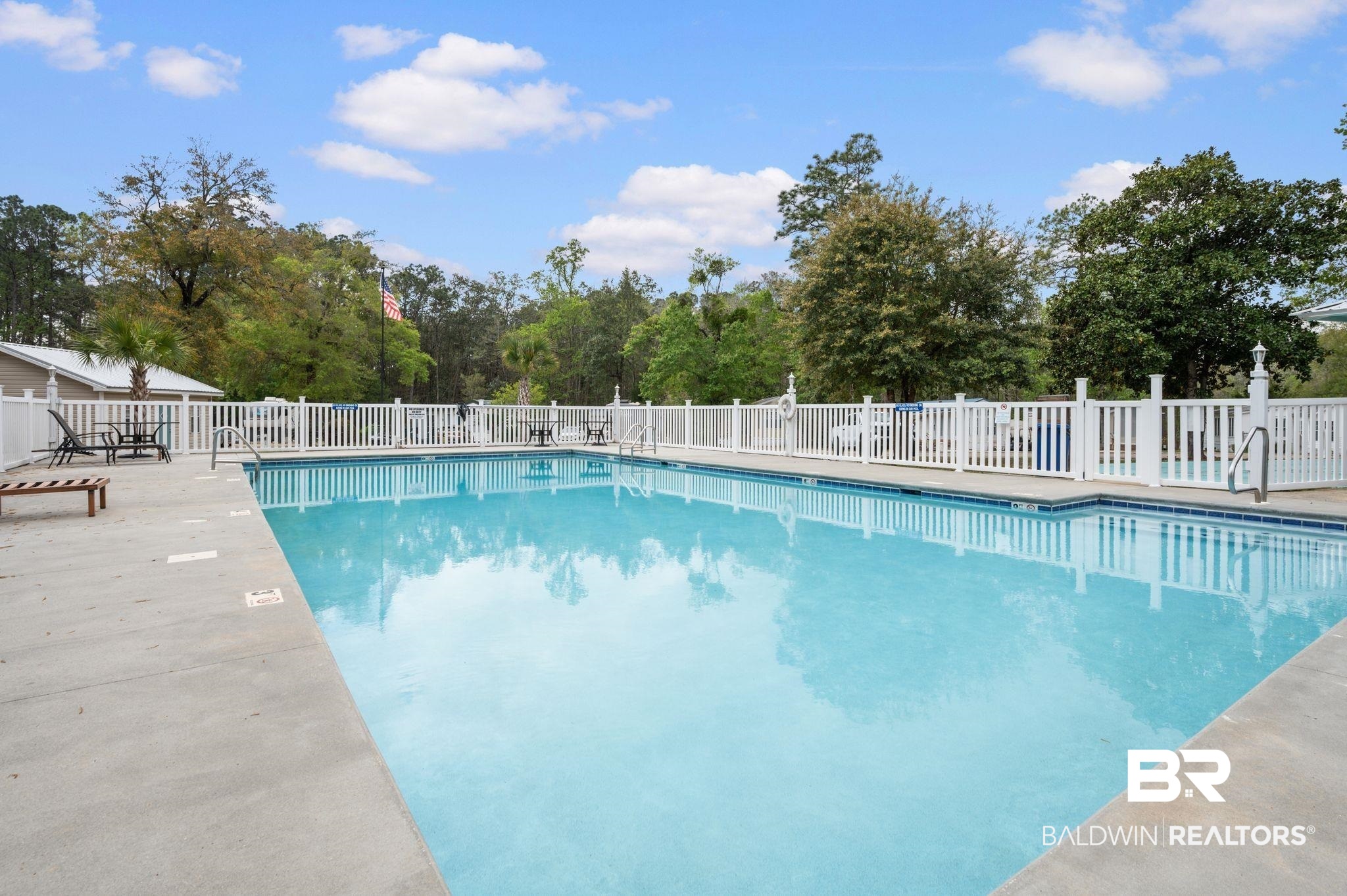 24711 County Road 20, Unit A11 Elberta, AL 36530 - Photo 34 of 35 Community pool featuring a patio