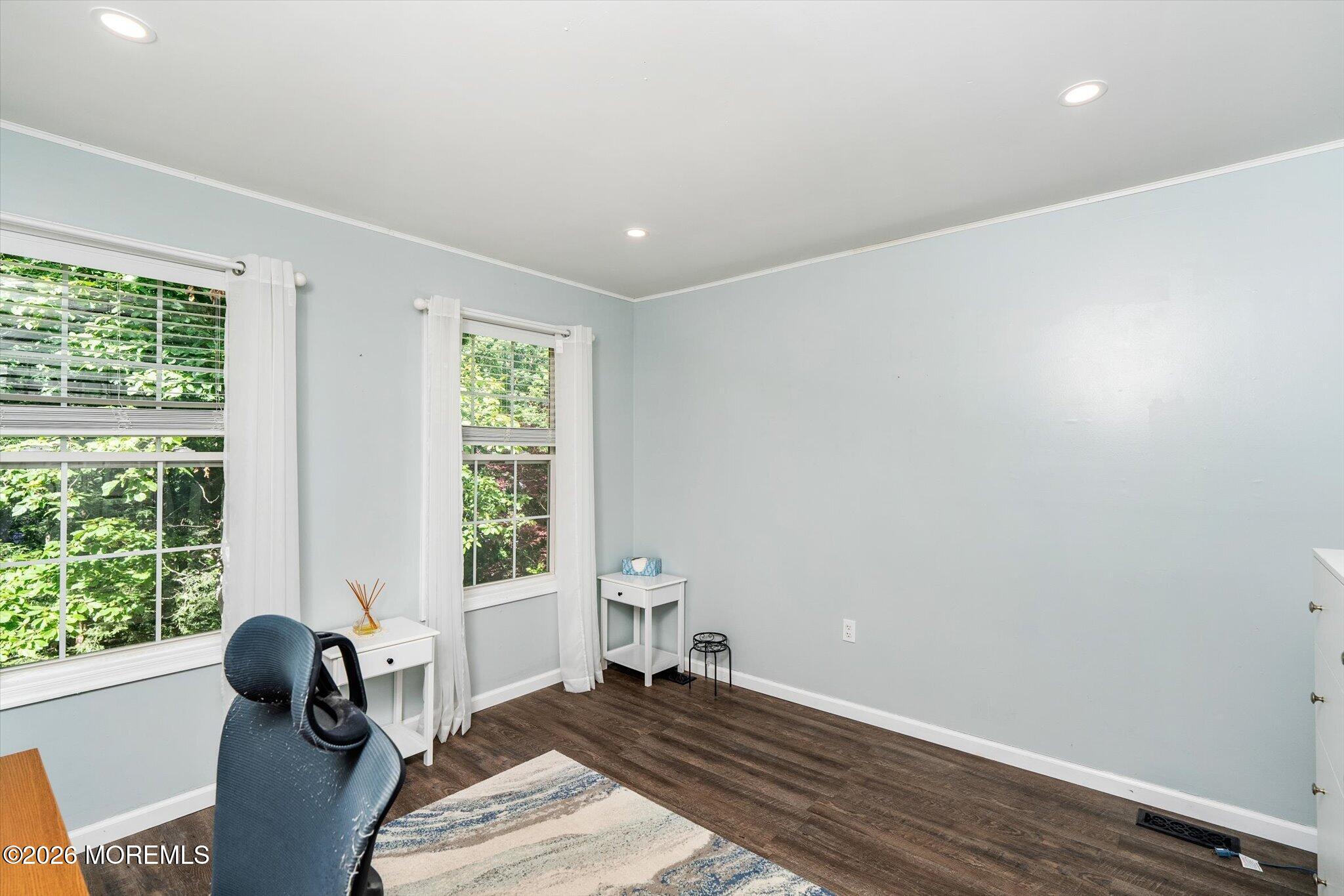 208 North Success Road Cream Ridge, NJ 08514 - Photo 17 of 40 a bedroom with a bed and wooden floor