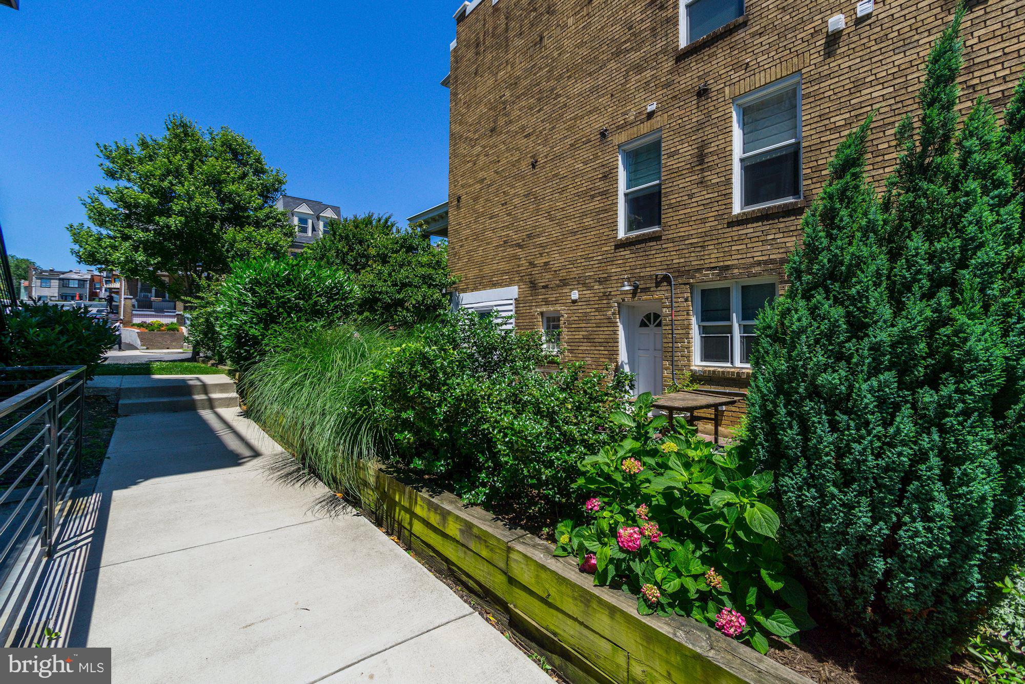 1352 Quincy Street Northwest, Unit 1 Washington, DC 20011 - Photo 13 of 26 a view of a garden with pathway