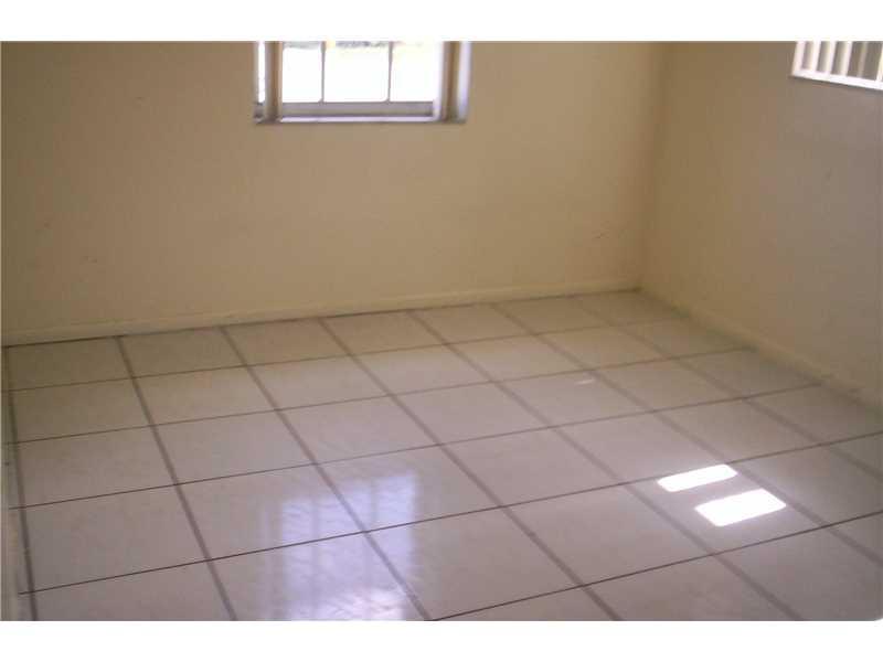 324 Northwest 42nd Street Oakland Park, FL 33309 - Photo 3 of 9 Living Room.