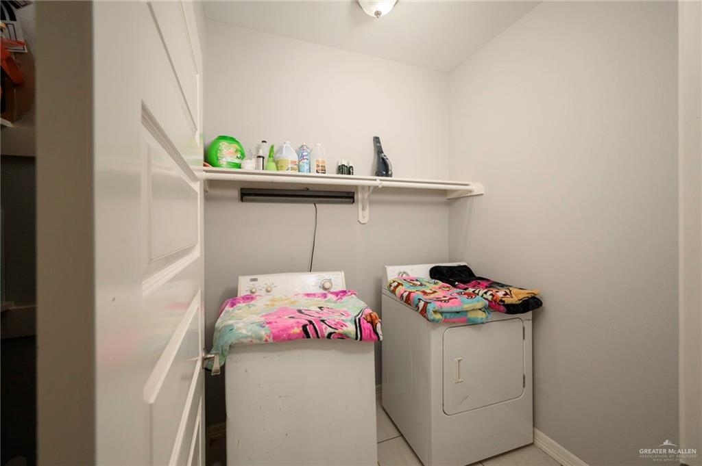 473 Pera Avenue Brownsville, TX 78521 - Photo 13 of 17 a bathroom with a sink and cabinets