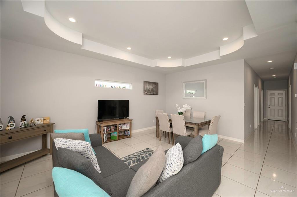 473 Pera Avenue Brownsville, TX 78521 - Photo 2 of 17 a living room with furniture and a flat screen tv