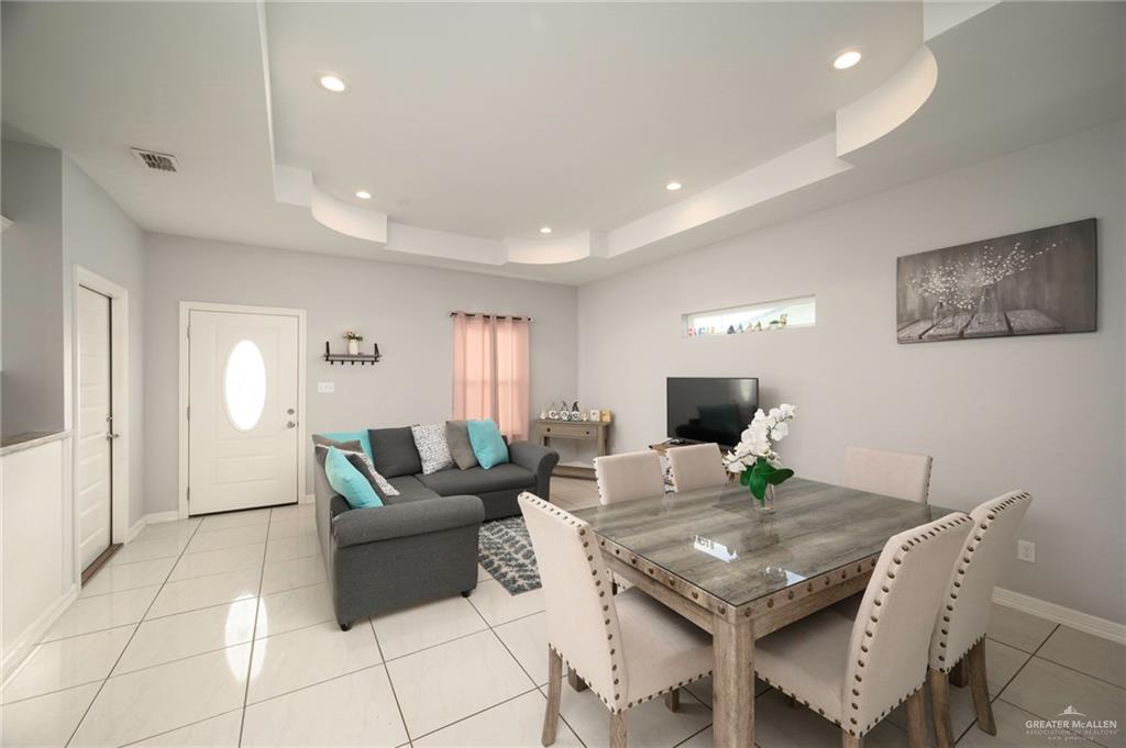473 Pera Avenue Brownsville, TX 78521 - Photo 4 of 17 a living room with furniture and a flat screen tv