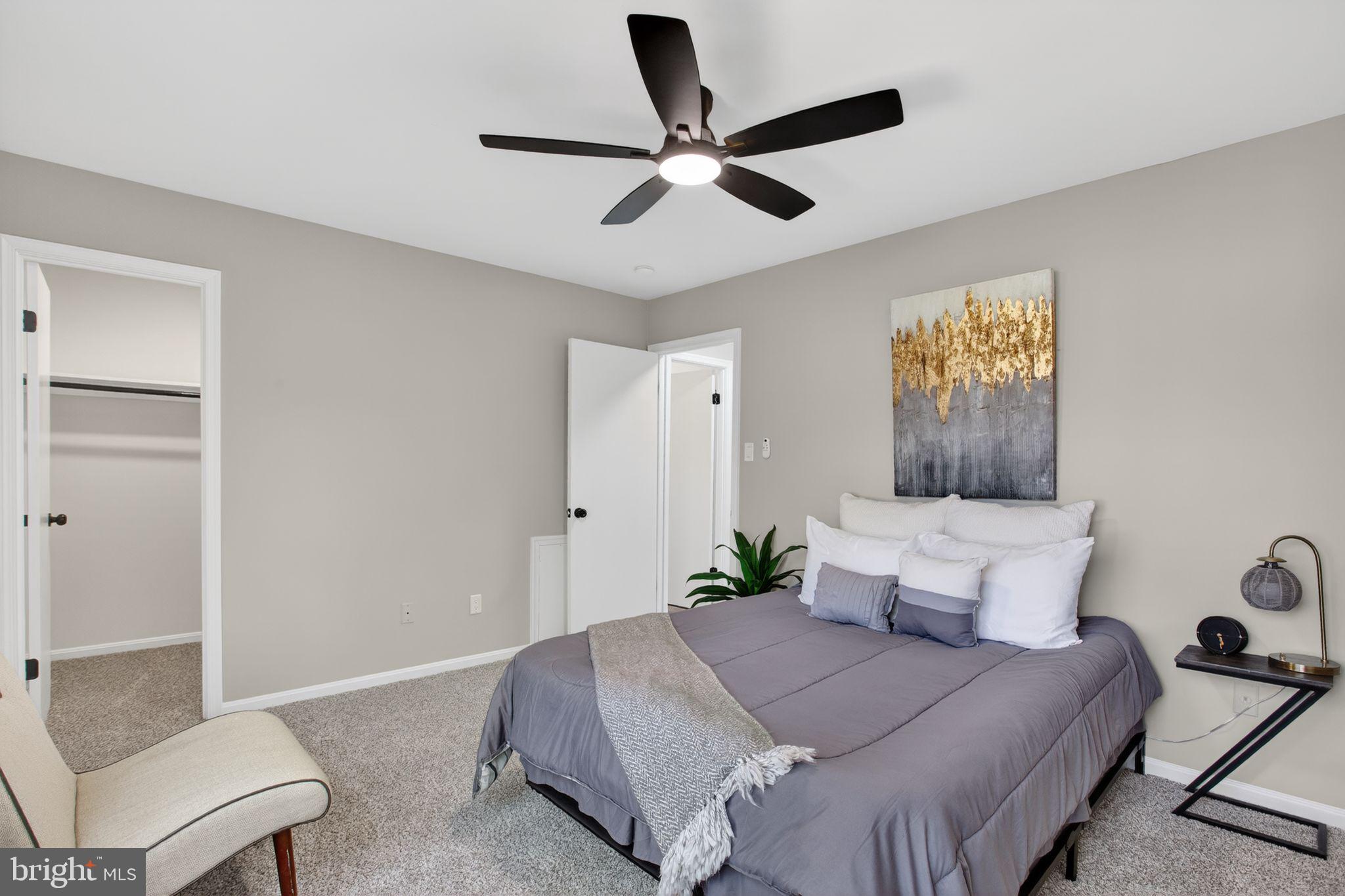 3278 Ryon Court Waldorf, MD 20601 - Photo 13 of 29 a bedroom with a bed and a chair