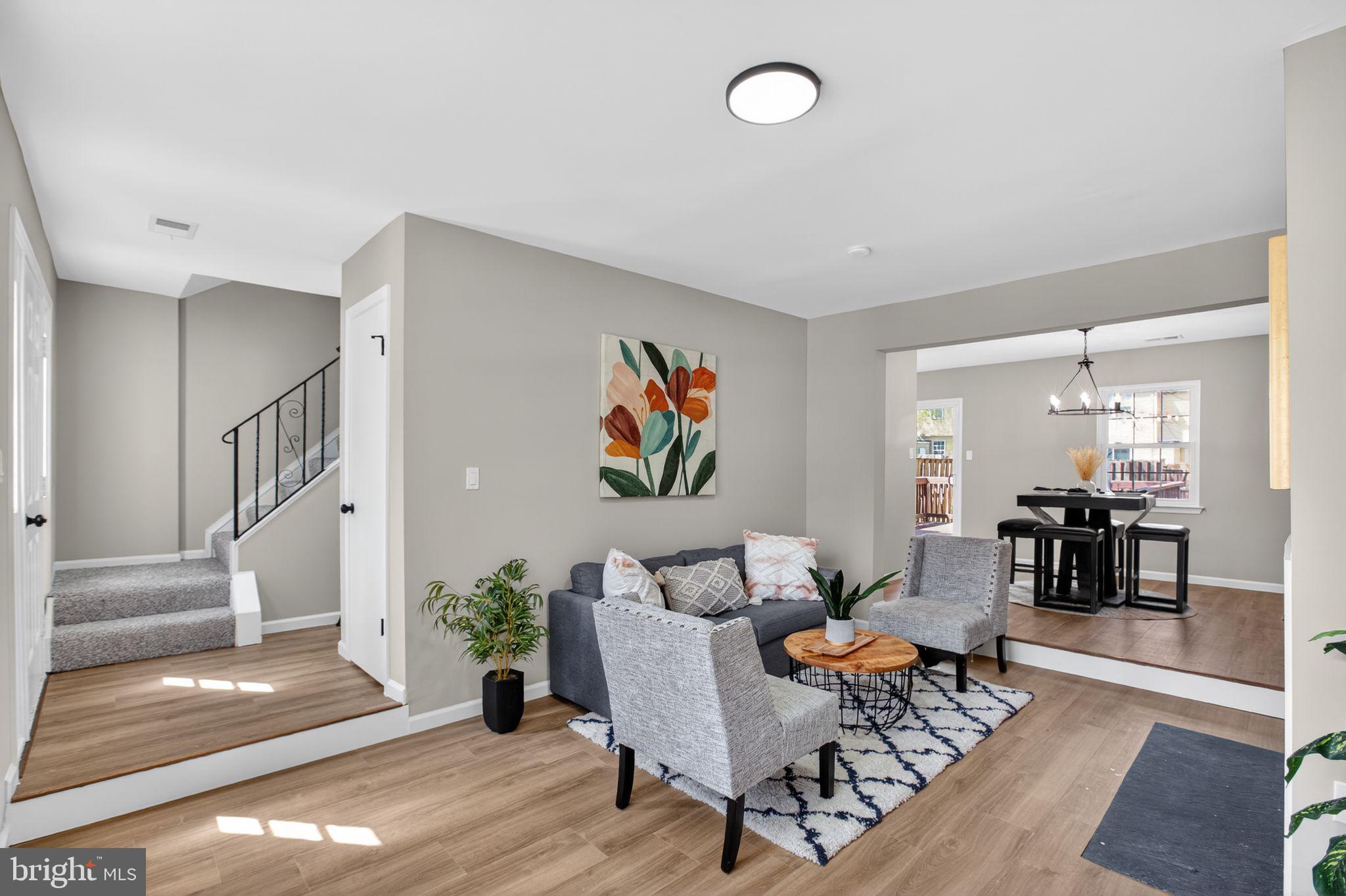 3278 Ryon Court Waldorf, MD 20601 - Photo 3 of 29 a living room with furniture and wooden floor