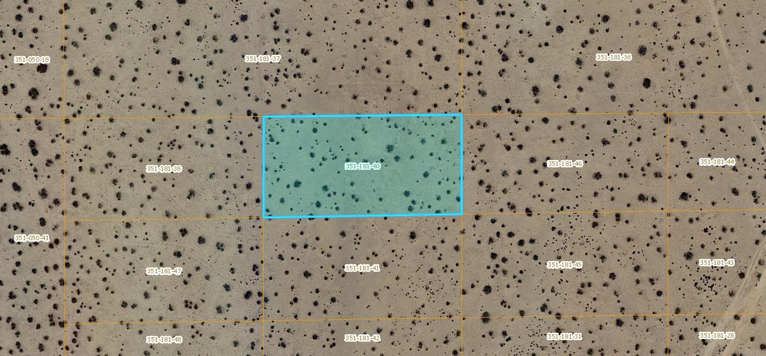 a bathroom with a toilet and a shower curtain