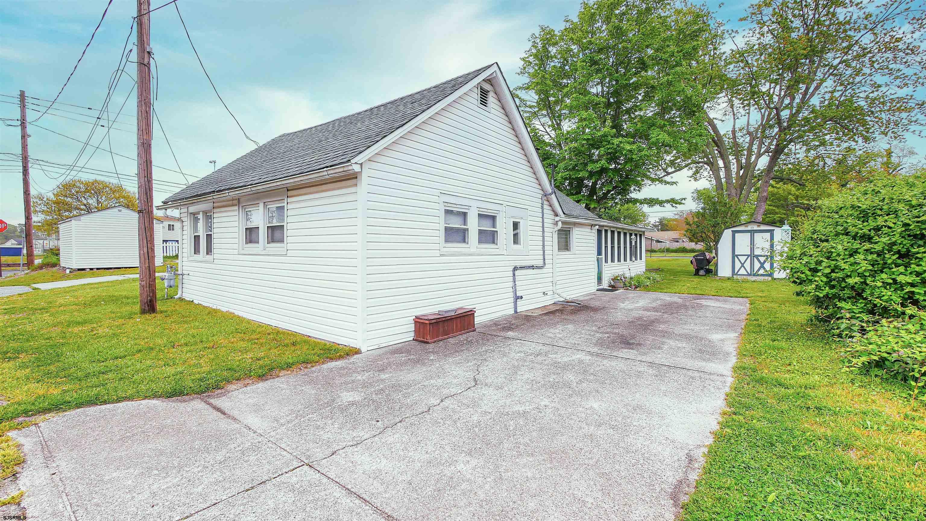 605 1st Street Somers Point, NJ 08244 - Photo 11 of 33 a view of a house with a patio