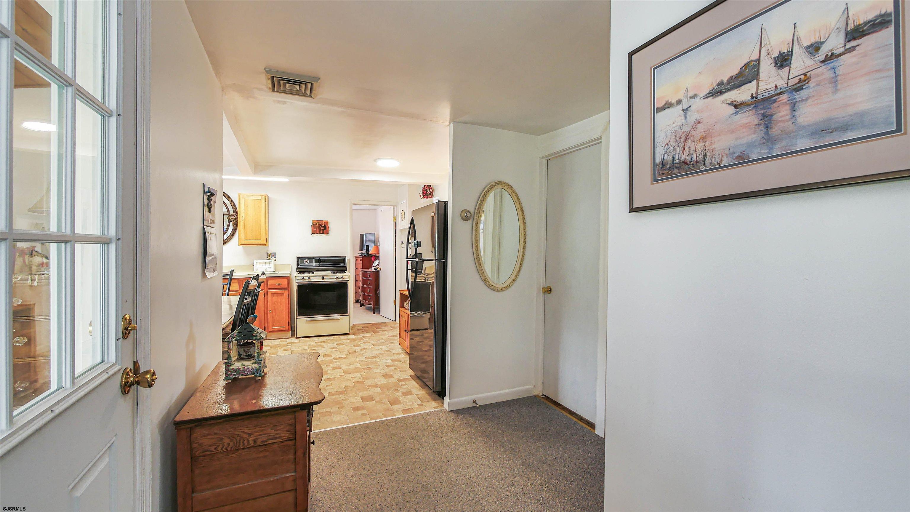 605 1st Street Somers Point, NJ 08244 - Photo 20 of 33 a view of a hallway with workspace