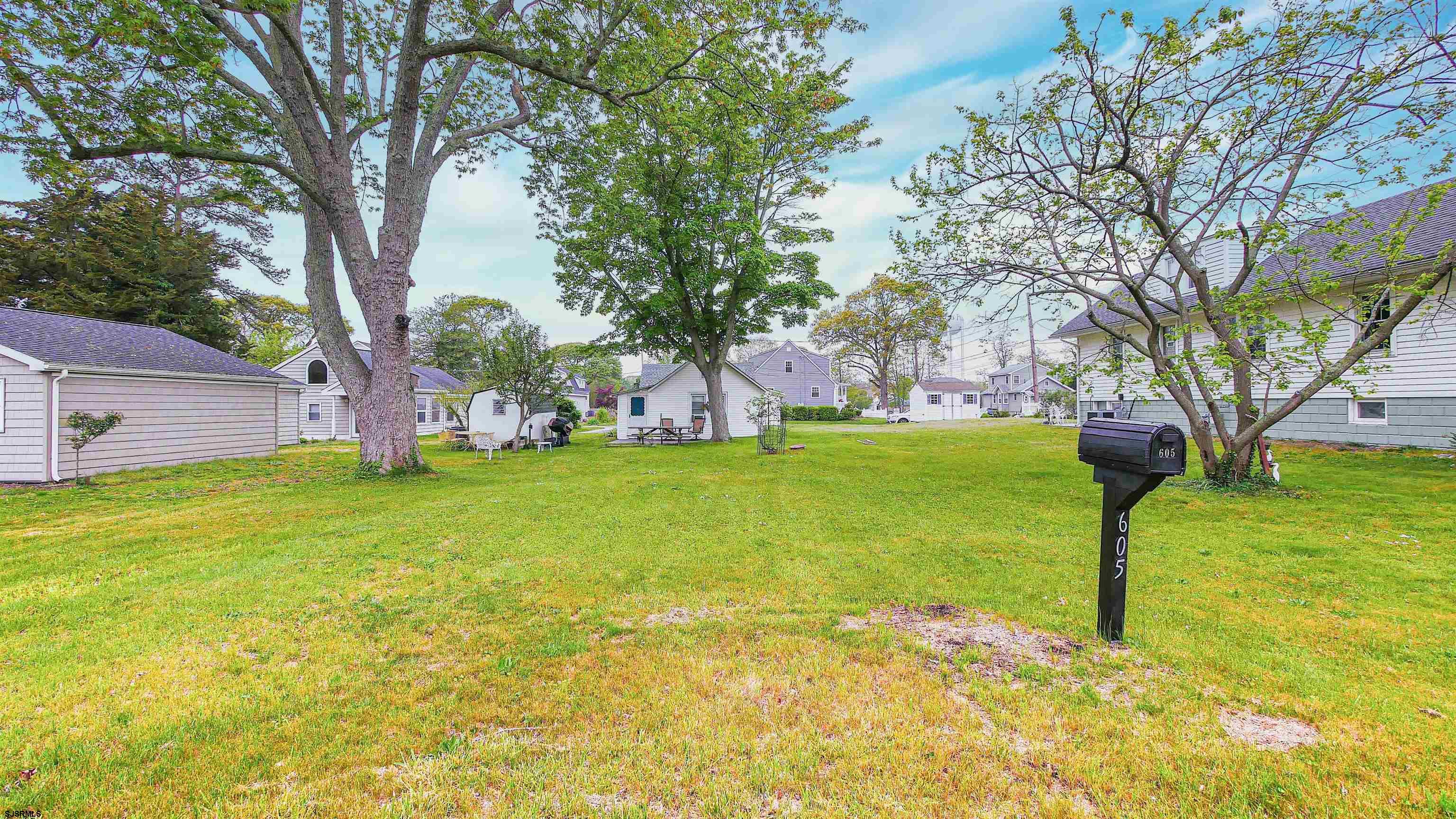 605 1st Street Somers Point, NJ 08244 - Photo 3 of 33 a view of yard with tree