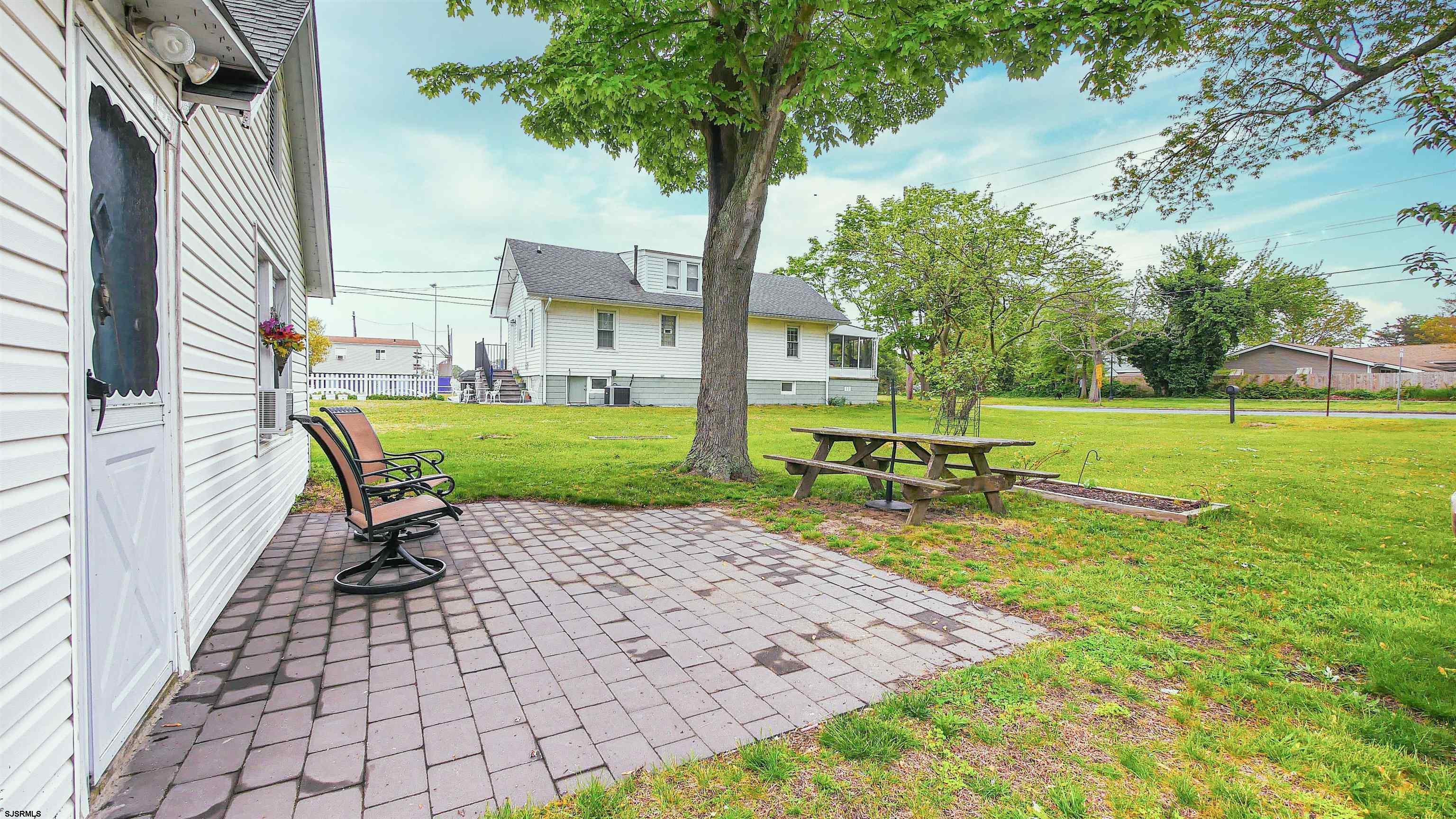 605 1st Street Somers Point, NJ 08244 - Photo 5 of 33 a view of a park with bench sitting area