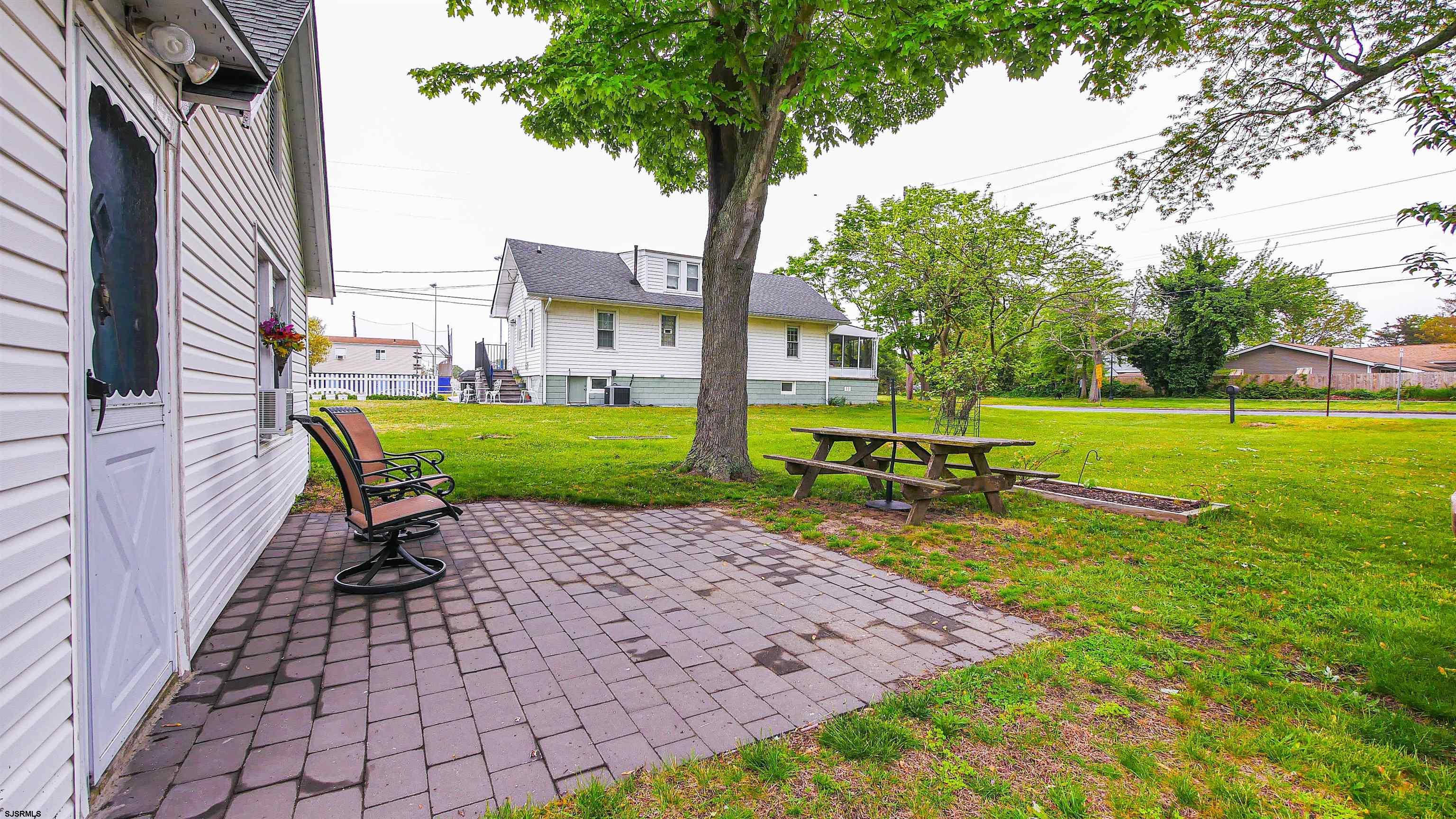 605 1st Street Somers Point, NJ 08244 - Photo 6 of 33 a view of a park with bench sitting area